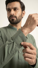 The Pista Green — cuff roll close-up with dark contrast tipping