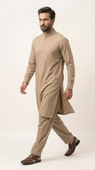 The Camel Brown — walking side profile showing full silhouette and drape