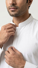 The Pure White — band collar and concealed placket close-up