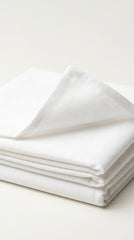 The Pure White — folded fabric yardage showing silky matte finish