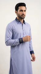 The Periwinkle Blue — three-quarter view showing contrast cuffs and collar