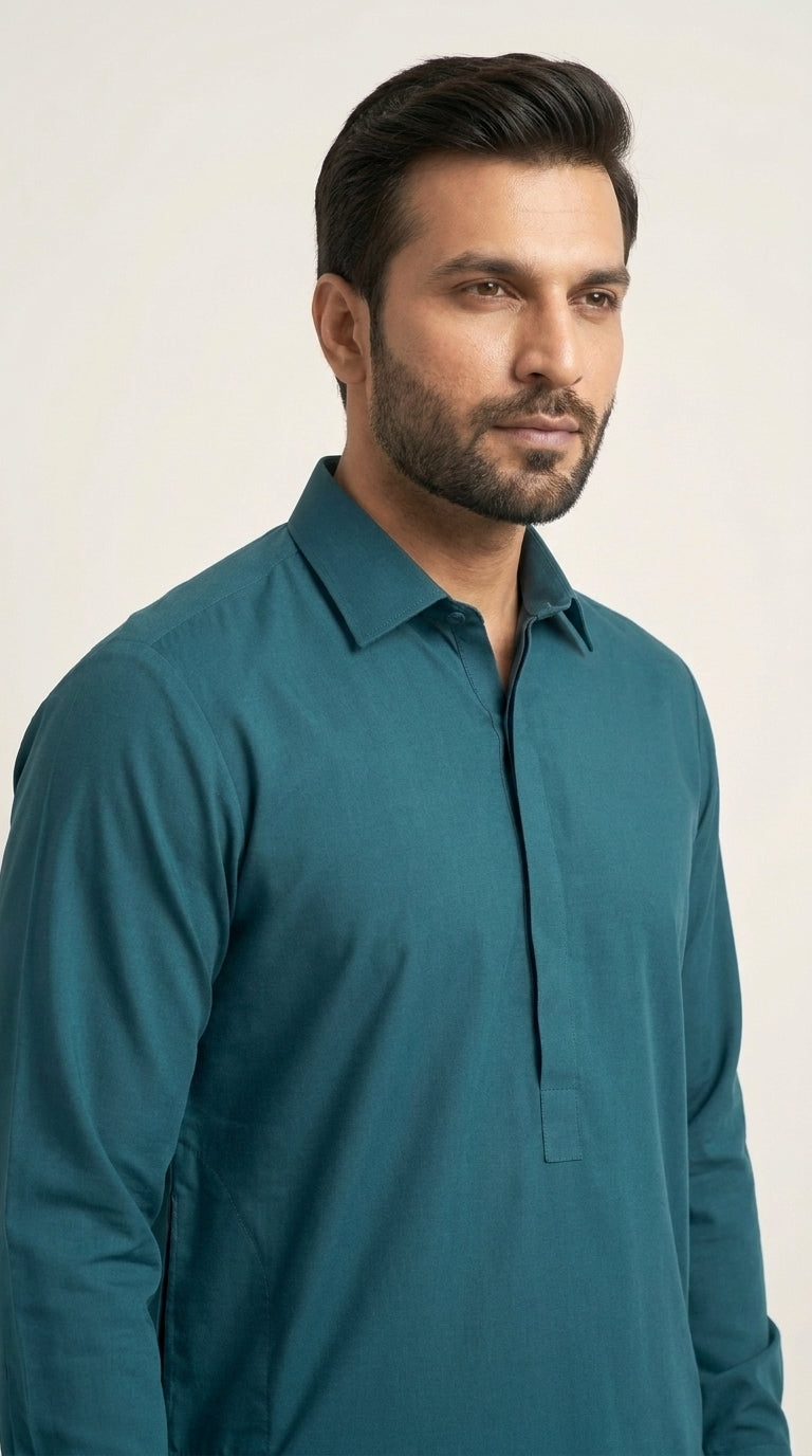 The Deep Teal — three-quarter view showing collar geometry and placket