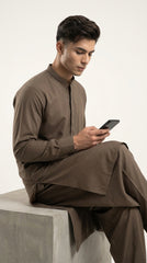 The Choco Brown — walking side profile showing full silhouette and drape