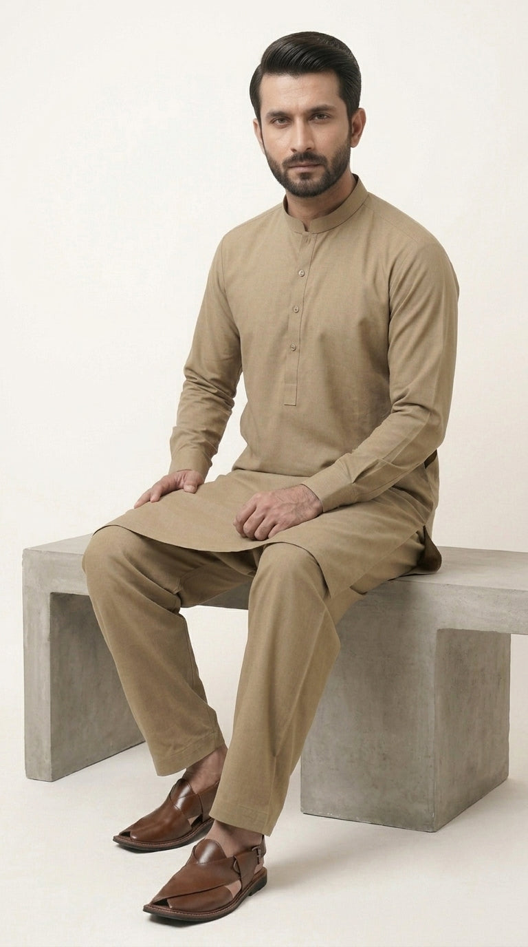 The Mud Dusk — walking side profile showing full kurta shalwar silhouette