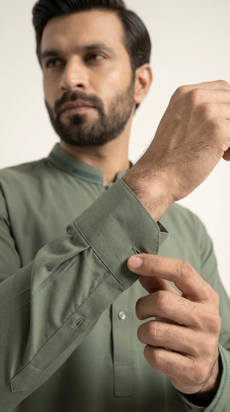 The Pista Green — cuff roll close-up with dark contrast tipping