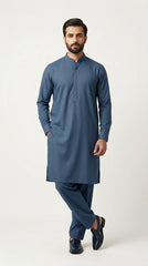 The Steel Blue — full front standing view hands clasped