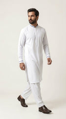 The Pure White — walking three-quarter view showing full kurta shalwar silhouette