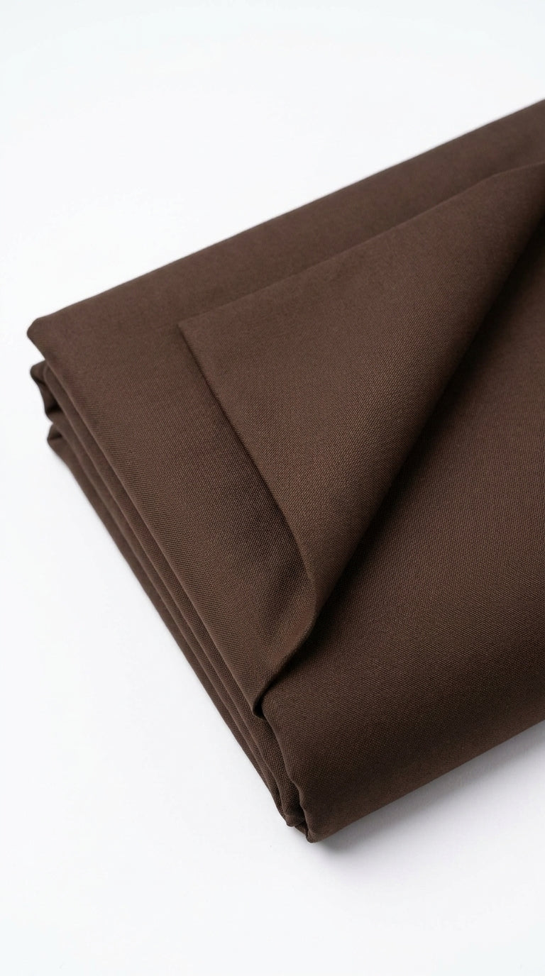 The Coco Brown — folded fabric yardage showing clean matte weave