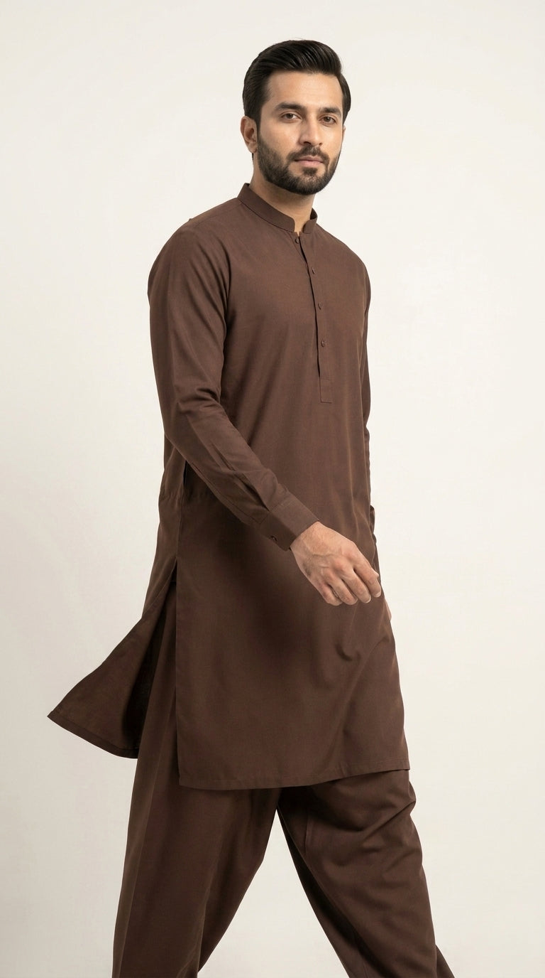 The Coco Brown — walking side profile showing drape and silhouette