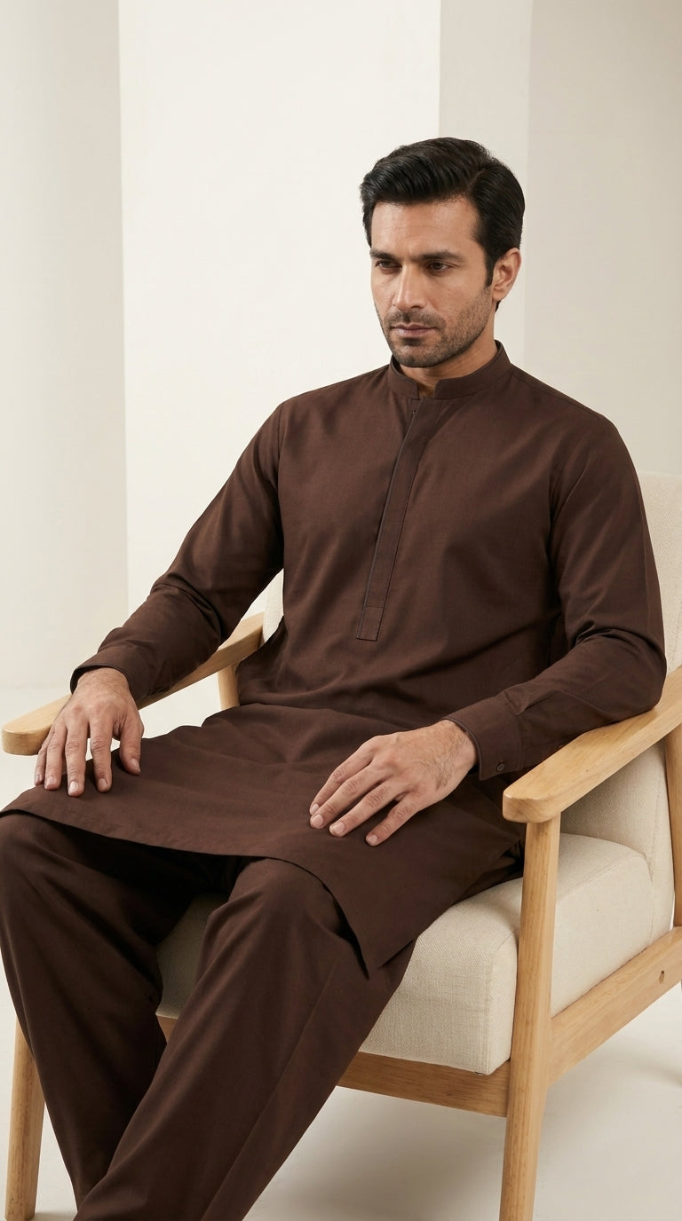 The Choco Brown — seated lifestyle shot with band collar on wooden chair
