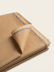 The Camel — folded fabric yardage with blue-stripe selvedge label