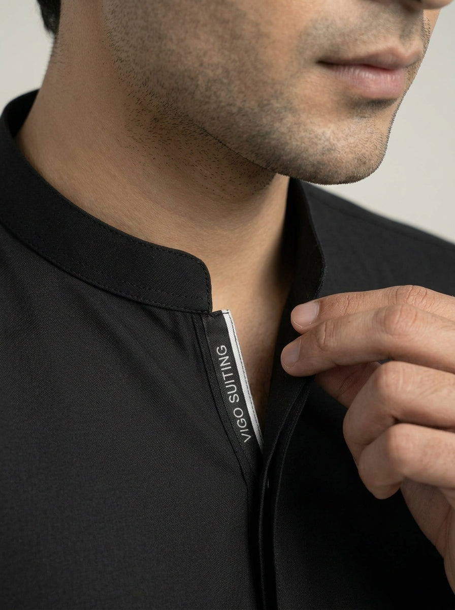 Vigo Star Jet Black shalwar kameez seated side view